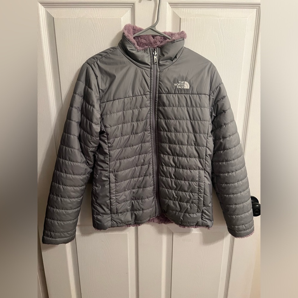 North Face youth size XL reversible full zip jacket has a few stains